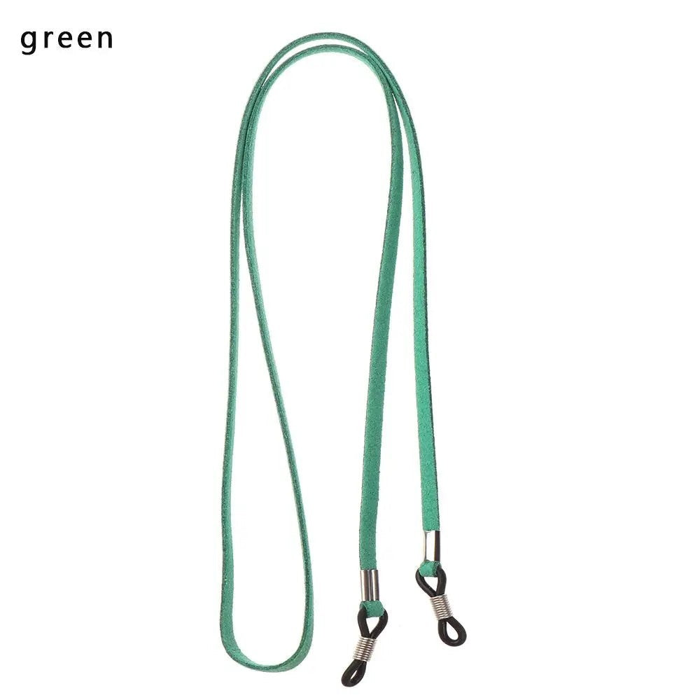 COMFORT green suede eyeglass chain strap with adjustable silicone loops and metal connectors.