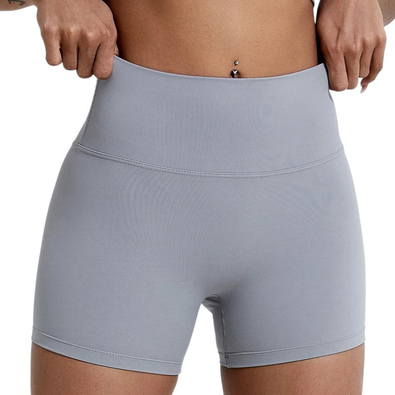 COMFORTHere grey athletic shorts for women with high waist and tummy control. Seamless, breathable, and moisture-wicking fabric.