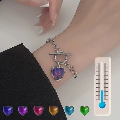 COMFORTH Heart shaped locket pendant necklace with thermochromic stone that changes color with body temperature, silver-tone finish.