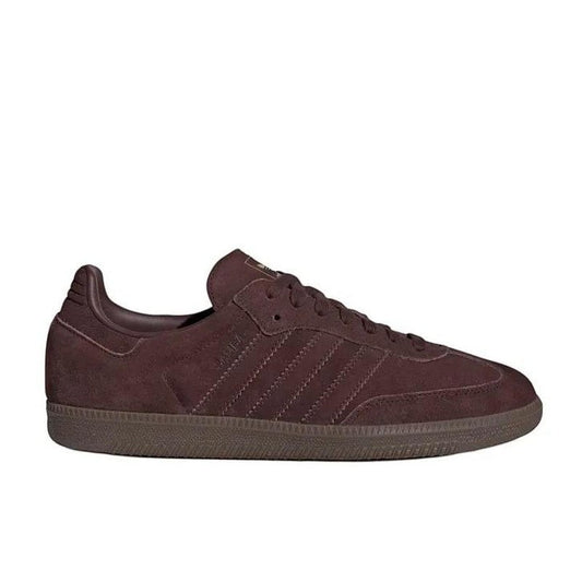 COMFORTHere burgundy suede Adidas Samba OG sneakers with gum sole and signature three stripes.