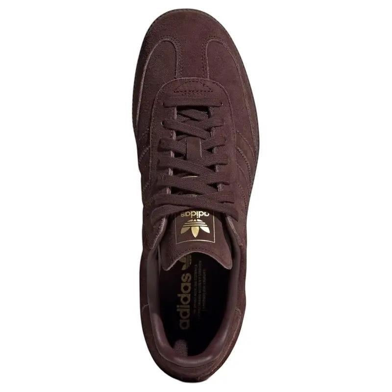 COMFORTHere Adidas Samba OG burgundy suede casual sneakers with gold logo detail.