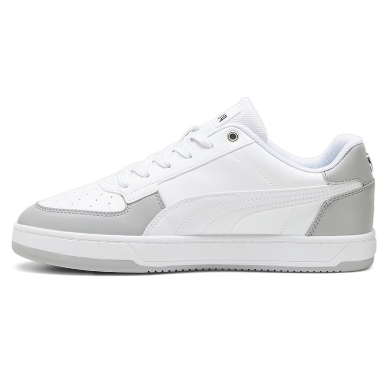 COMFORTHere Puma Mercedes AMG Petronas Formula 1 sneakers in white synthetic leather with grey overlays and turquoise branding.