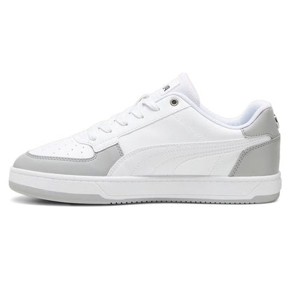 COMFORTHere Puma Mercedes AMG Petronas Formula 1 sneakers in white synthetic leather with grey overlays and turquoise branding.