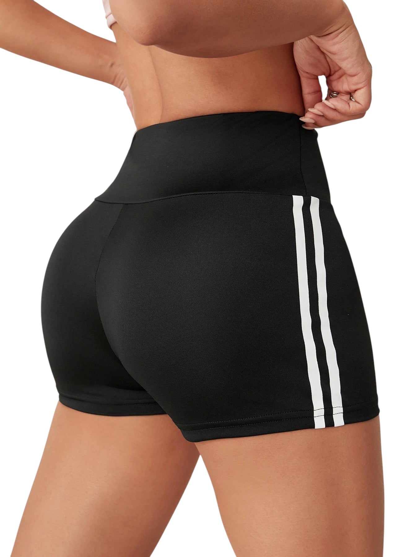 COMFORTHigh waisted black athletic shorts with white side stripe detail, moisture-wicking fabric.