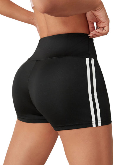 COMFORTHigh waisted black athletic shorts with white side stripe detail, moisture-wicking fabric.