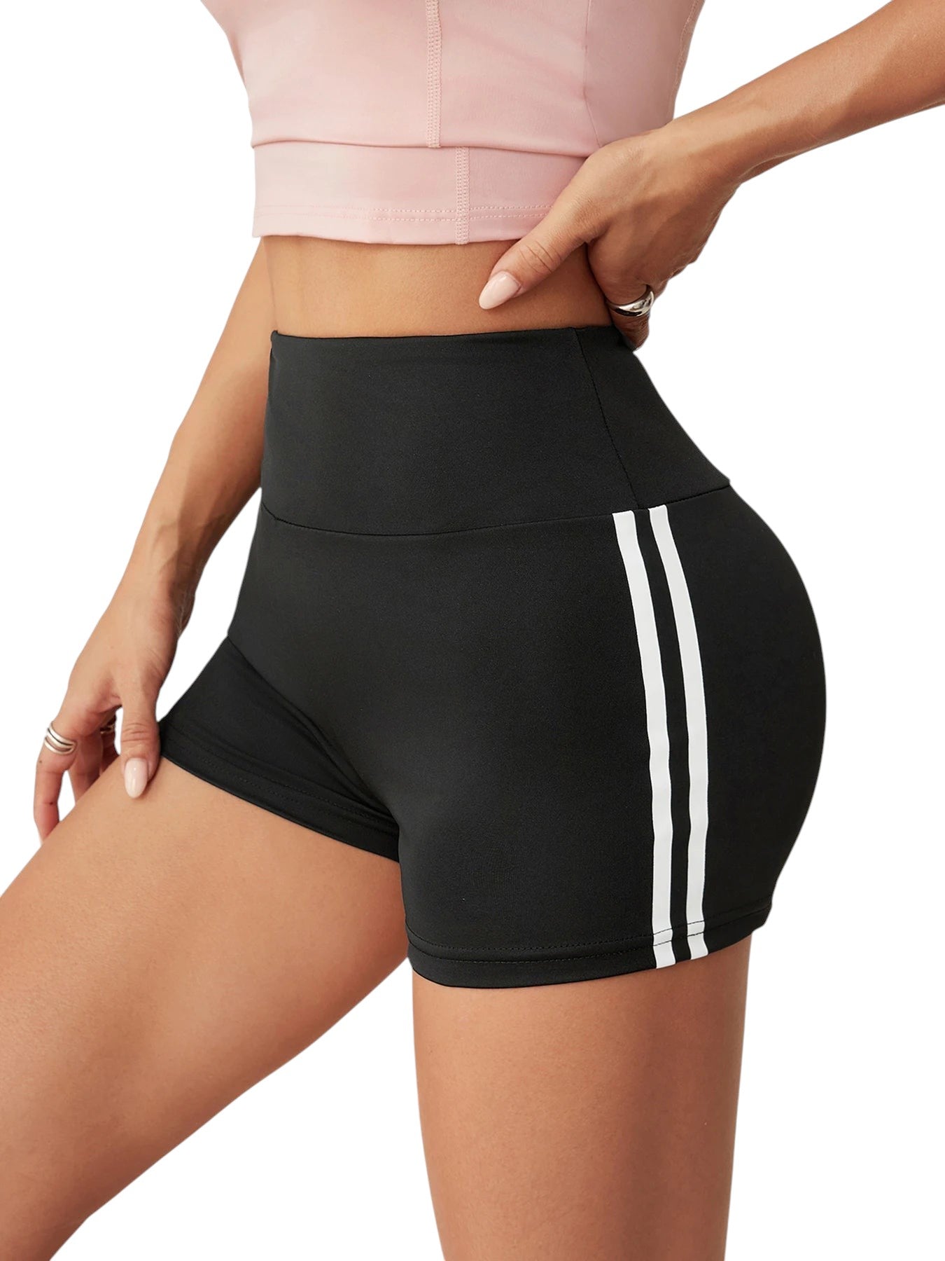 COMFORTHigh waisted black athletic shorts with white side stripe detail. Moisture-wicking fabric.