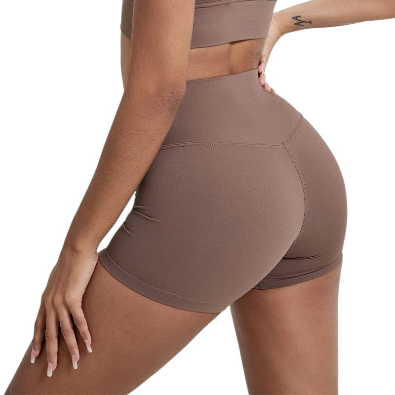 COMFORTHere women's brown seamless high-waisted athletic shorts with tummy control and four-way stretch fabric.