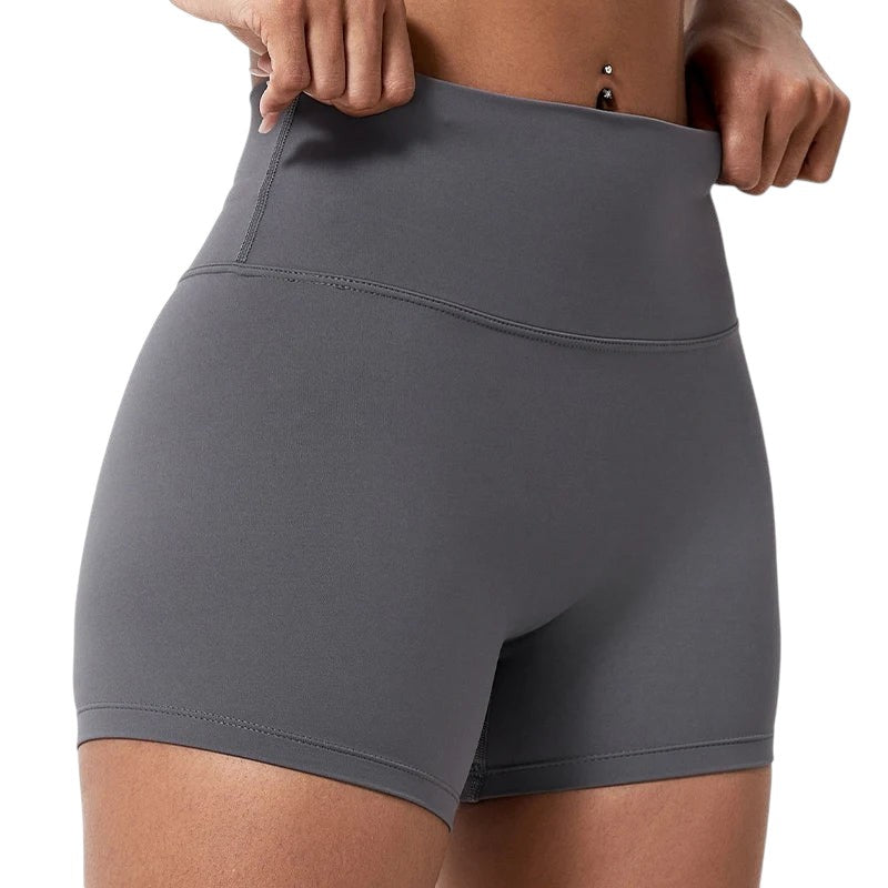 COMFORTHere grey high-waisted athletic shorts for women, seamless, four-way stretch, moisture-wicking fabric.
