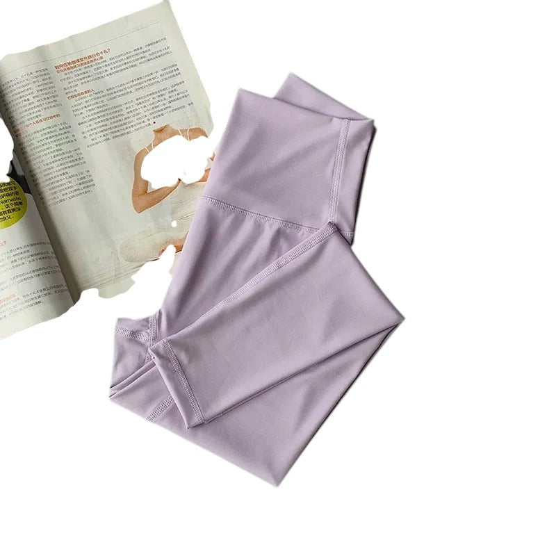 COMFORT women's high-waisted lavender activewear leggings made of soft, stretchy fabric. Ideal for yoga, running, or lounging.