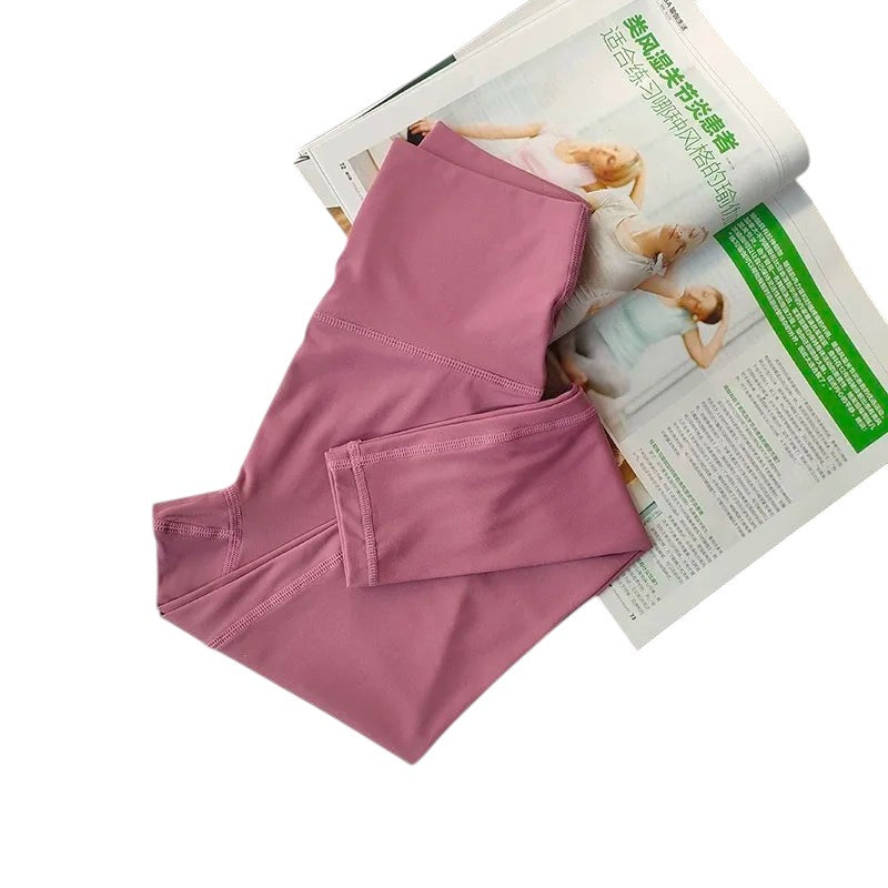 COMFORT women's high-waisted mauve activewear leggings with a flattering fit and supportive waistband.