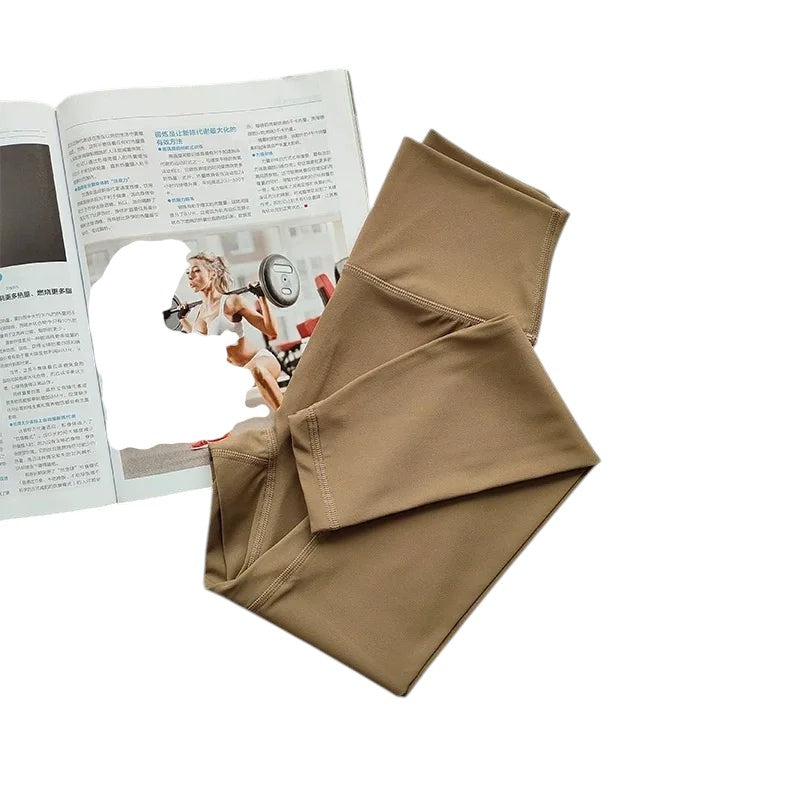 COMFORT women's high-waisted activewear leggings in a neutral tan color. Soft, stretchy fabric with a flattering fit.