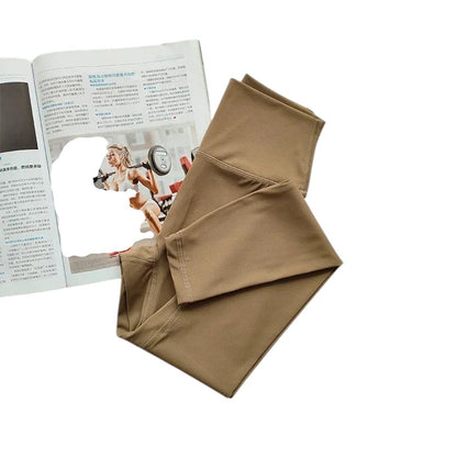 COMFORT women's high-waisted activewear leggings in a neutral tan color. Soft, stretchy fabric with a flattering fit.
