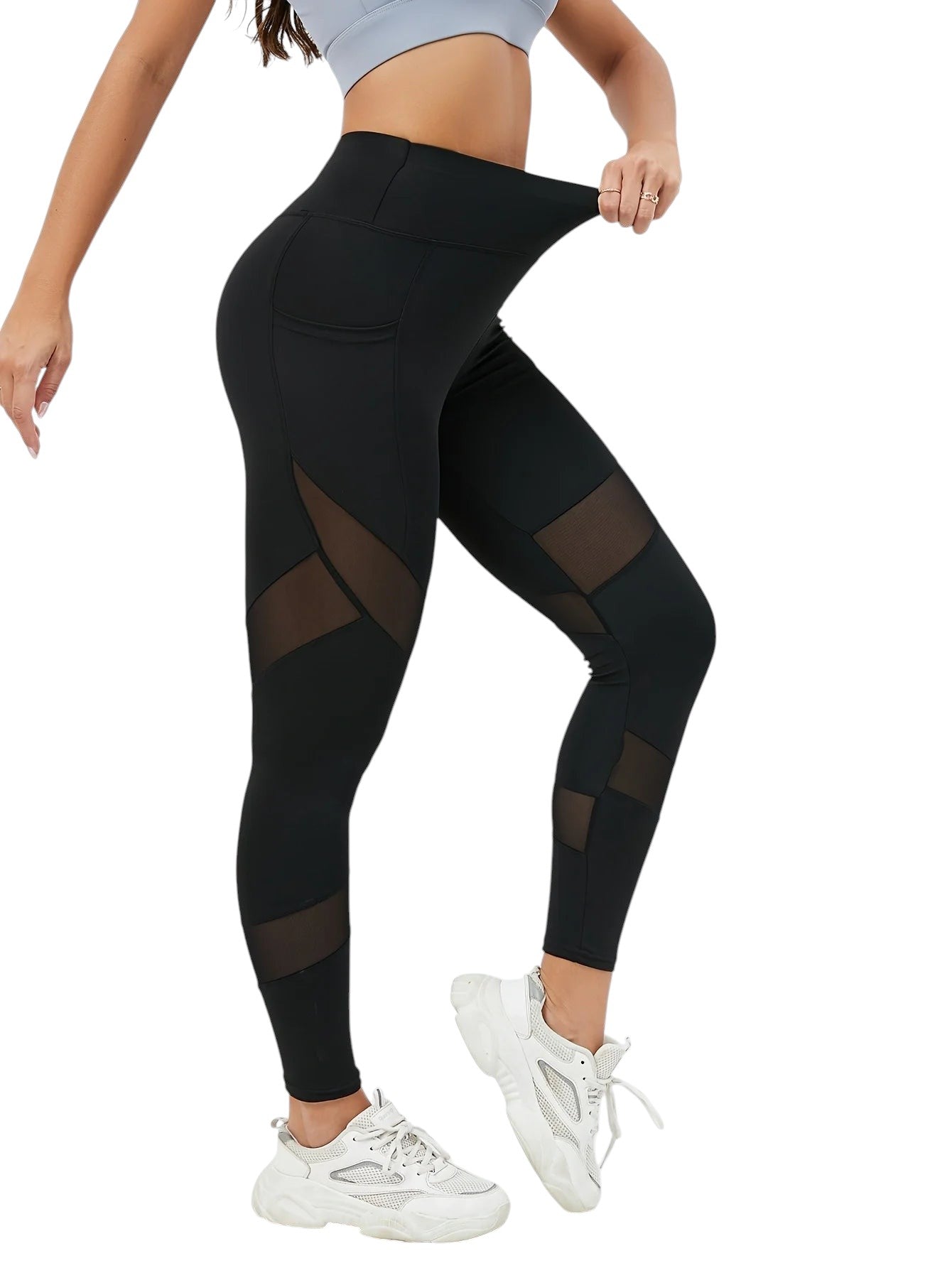 COMFORTHigh waisted black leggings with mesh panel detailing on the legs and side pockets. Perfect for workouts.