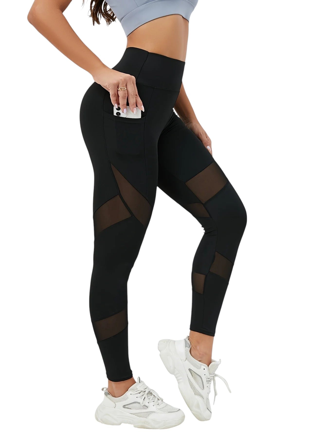 COMFORTHigh-waisted black leggings with mesh panels and side pockets. Perfect for yoga, running, or gym.