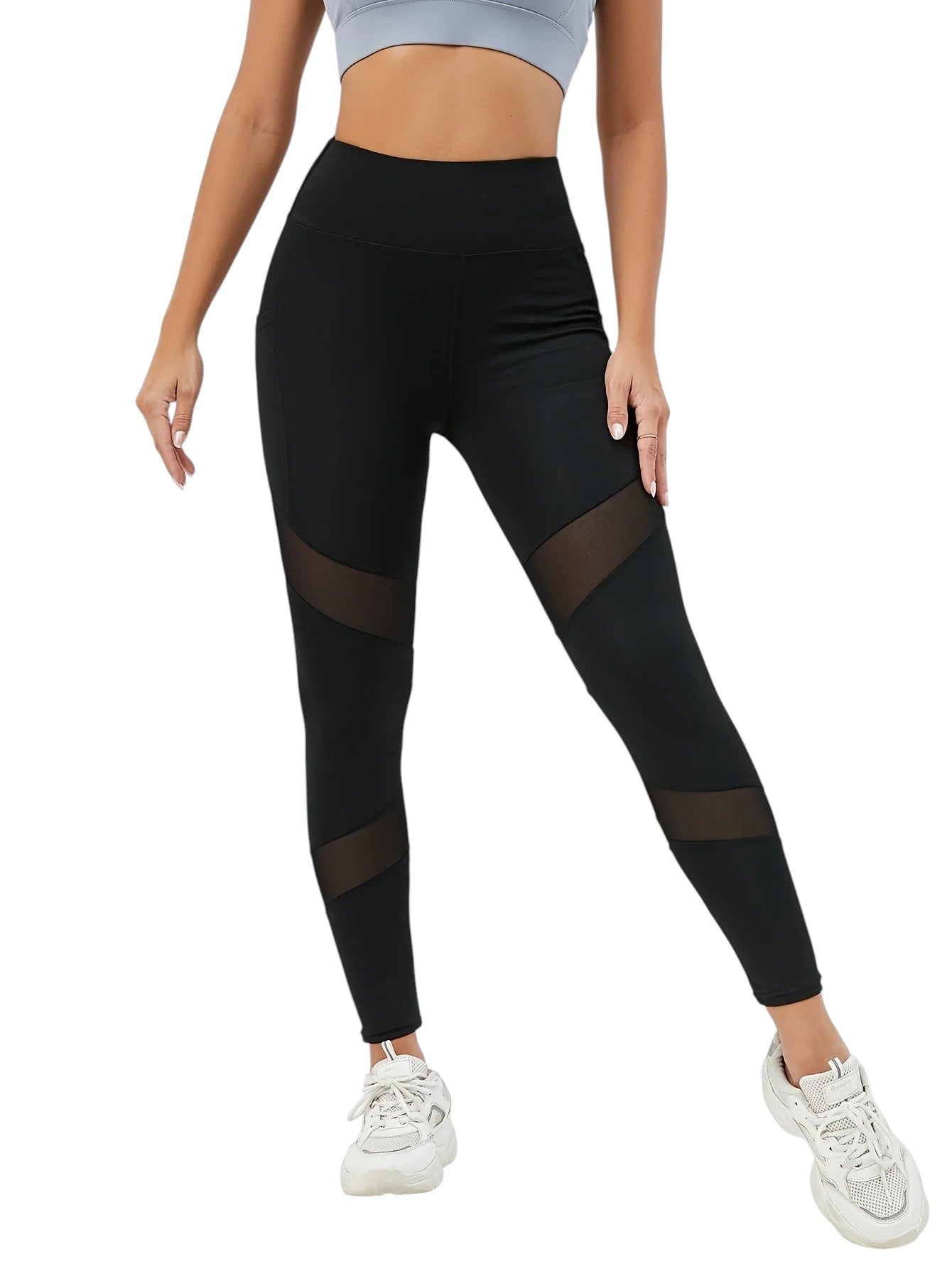 COMFORTHigh waisted black leggings with mesh panels on the legs and side pockets.