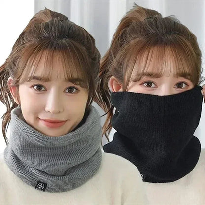 COMFORT grey and black knit neck gaiter scarves with fleece lining for warmth. Versatile winter accessory.