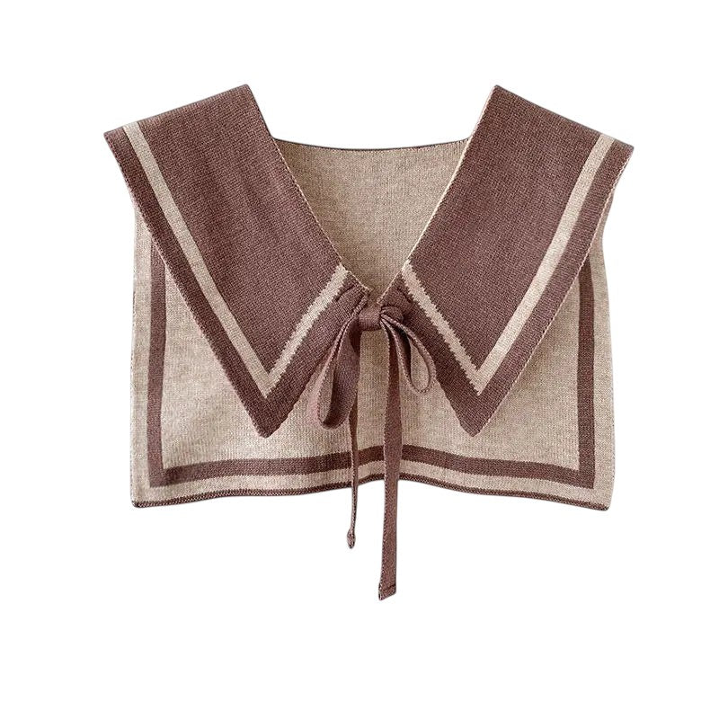 COMFORTH knit sailor collar in brown and beige with contrasting trim and tie closure. Detachable accessory.