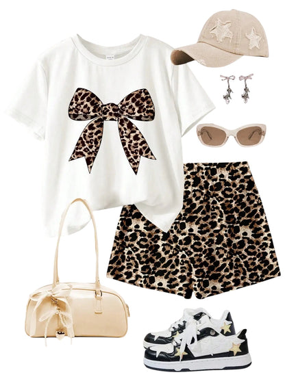 COMFORTH white t-shirt with leopard bow graphic and matching leopard print shorts. Cotton set.