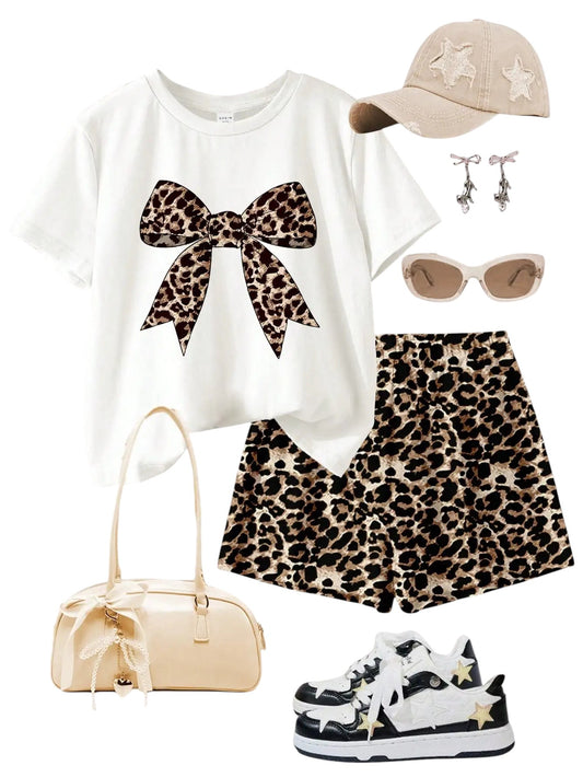 COMFORTH white t-shirt with leopard bow graphic and matching leopard print shorts. Cotton set.
