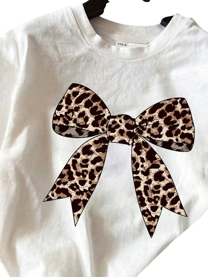 COMFORTH white cotton t-shirt with leopard print bow graphic. Part of a matching set.