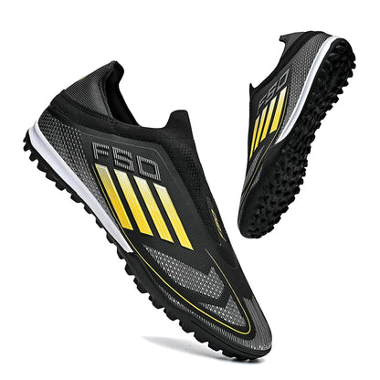 COMFORTH men's black and yellow laceless soccer cleats with synthetic upper and turf outsole.