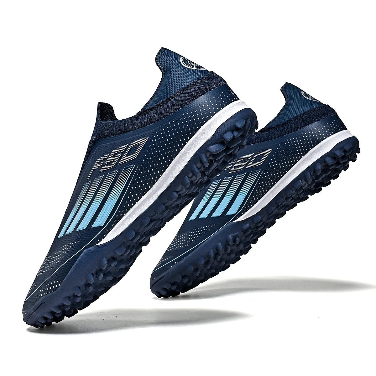 COMFORTH men's navy blue laceless soccer cleats with white accents and blue gradient stripes. Turf outsole.