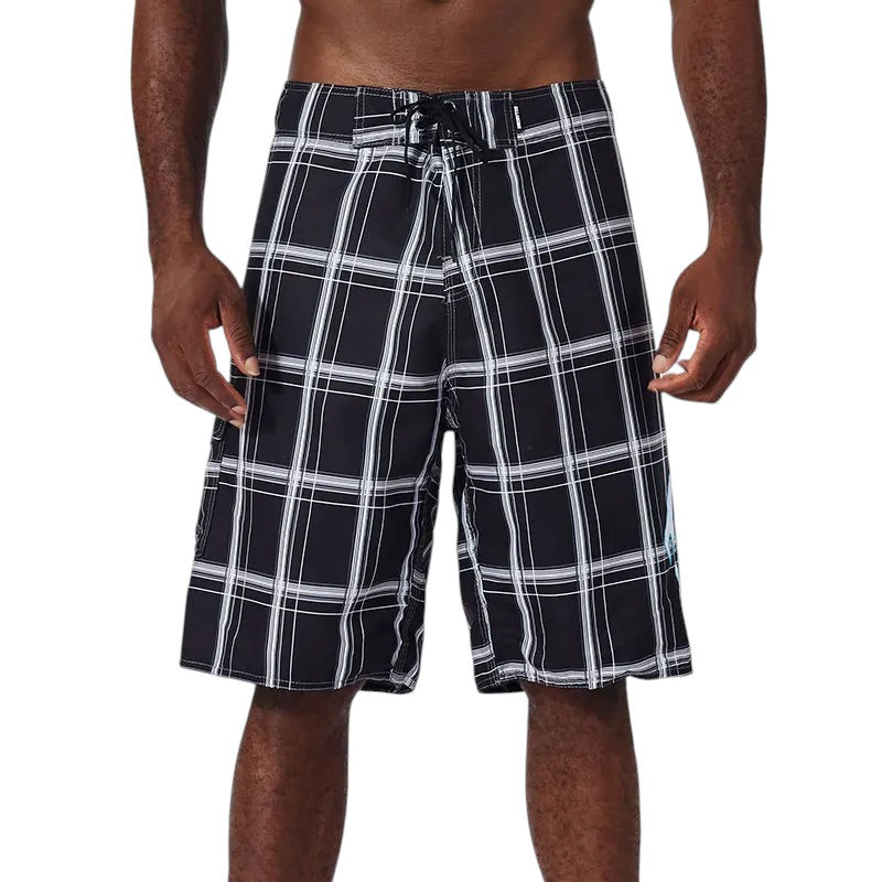 COMFORTH Men's athletic board shorts in black and white plaid. Quick-drying fabric with drawstring closure.
