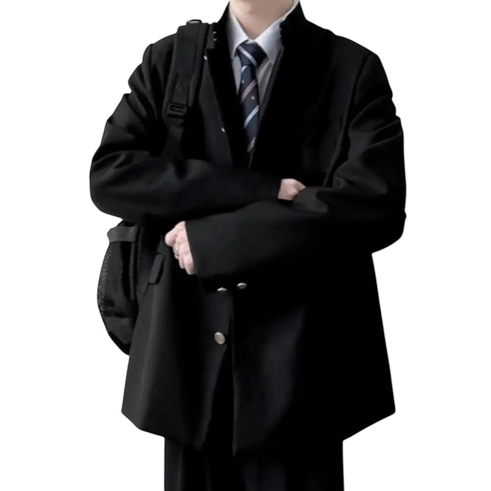 COMFORTH Men's black blazer jacket with mandarin collar, button closure, and tie. Model wears backpack.
