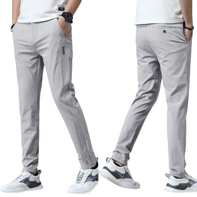 COMFORTH Men's light grey casual stretch chino pants, slim fit, cotton-spandex blend, versatile for work or leisure.