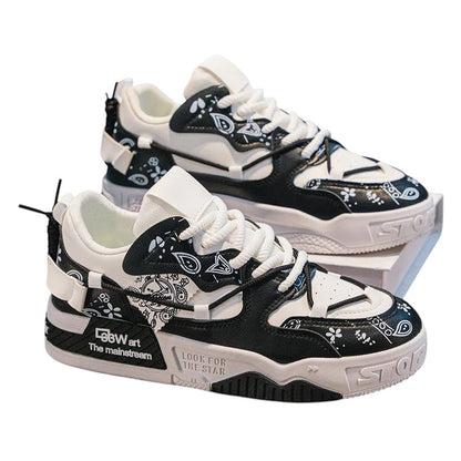 COMFORT Men's black and white fashion sneakers with graphic accents and chunky soles.
