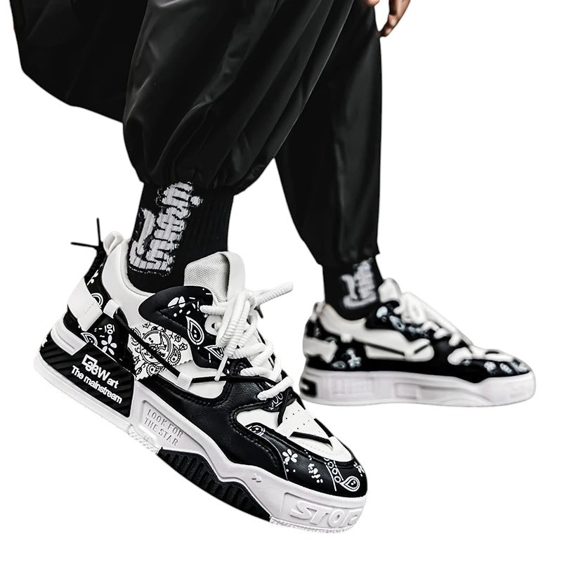 COMFORT Men's black and white sneakers with graphic accents and bandana print. Lace-up closure, chunky sole.