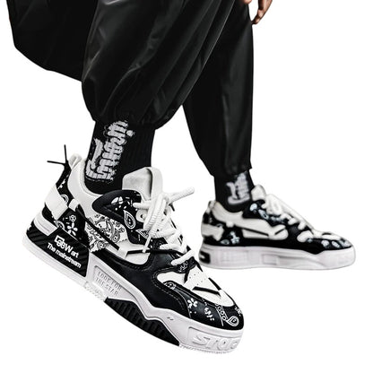 COMFORT Men's black and white sneakers with graphic accents and bandana print. Lace-up closure, chunky sole.