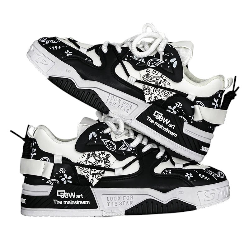 COMFORT Men's black and white fashion sneakers with graphic accents and chunky soles.
