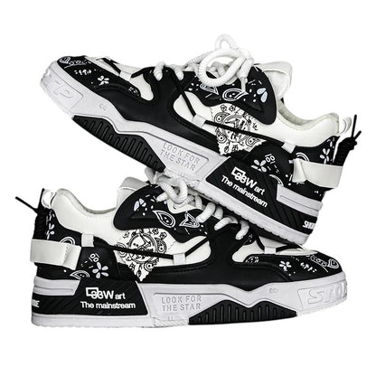 COMFORT Men's black and white fashion sneakers with graphic accents and chunky soles.