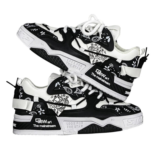 COMFORT Men's black and white fashion sneakers with graphic accents and chunky soles.