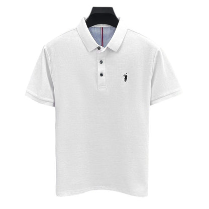 COMFORTH men's white pique knit short sleeve polo shirt with embroidered logo and striped inner collar.