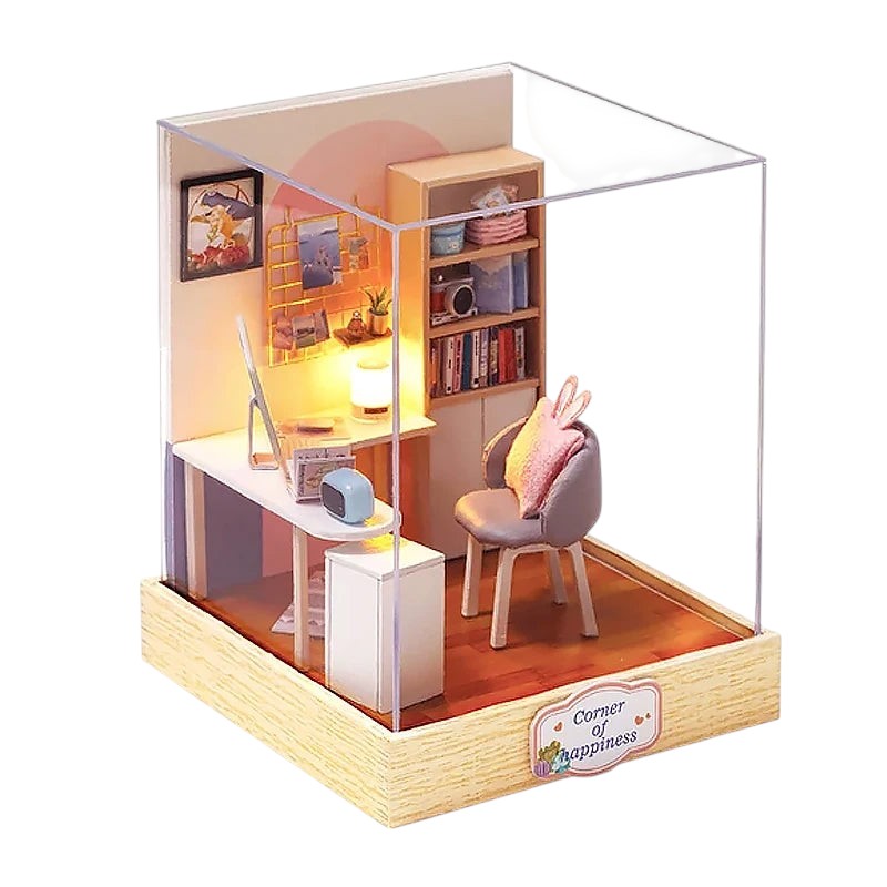COMFORTH miniature dollhouse building kit featuring a desk, chair, bookshelf, and decor. Includes a lamp, computer, and pink bunny pillow.