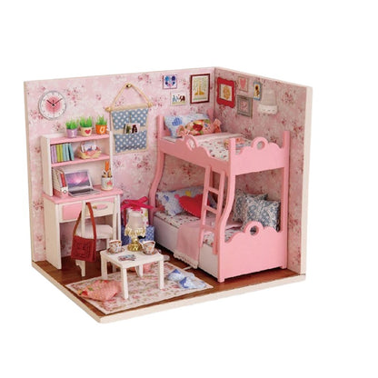 COMFORTH miniature dollhouse building kit with pink bunk beds, desk, and floral wallpaper.