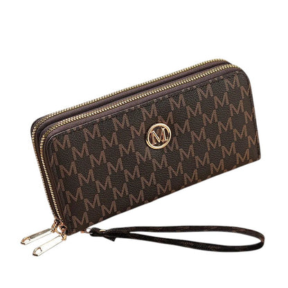 COMFORTH brown faux leather wristlet wallet with all-over "M" monogram and gold-tone emblem. Features dual zips and card slots.