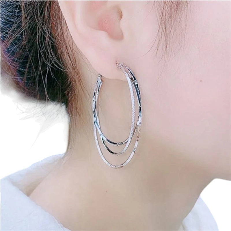 COMFORTH elegant silver multi-layered oval hoop earrings with textured finish for women.