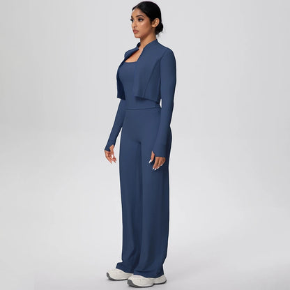 COMFORT Women's navy blue three-piece athletic set with cropped jacket, scoop neck bra, and wide-leg pants.
