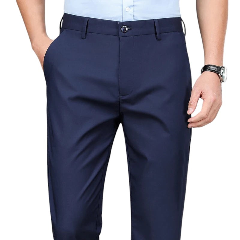 COMFORTH Men's navy blue stretch dress pants with a flat front and tailored fit. Ideal for professional or smart-casual wear.