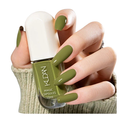 COMFORTH 10ml bottle of olive green water-based peel-off nail polish, matte finish, on nails.