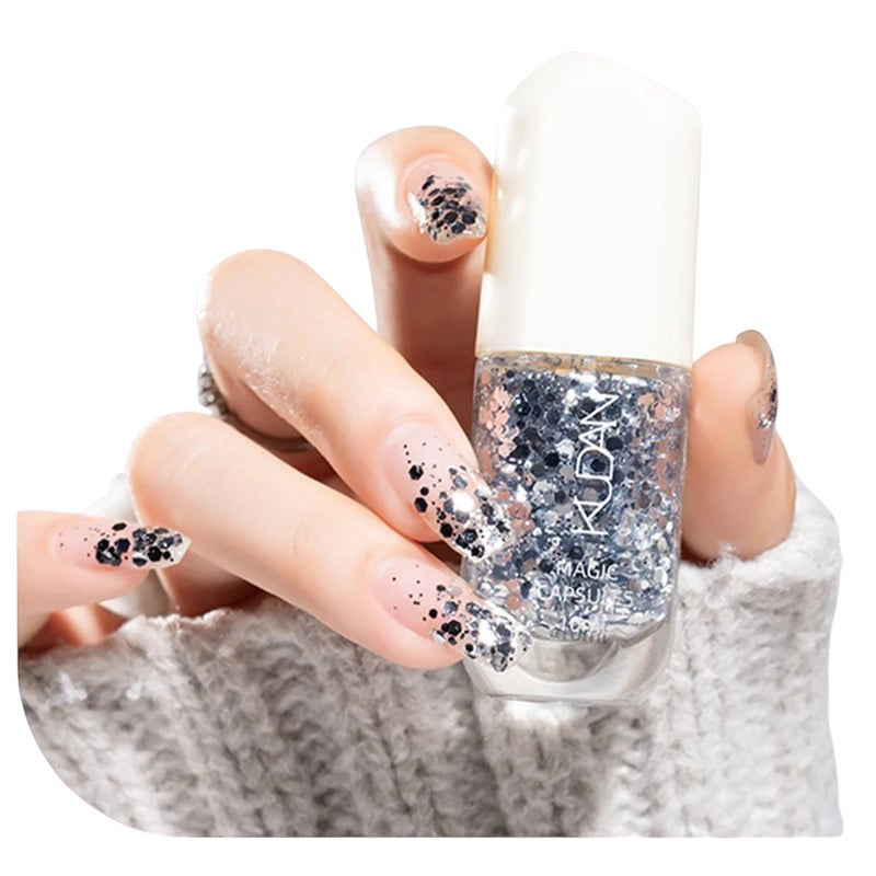 COMFORTH water-based peel off nail polish with silver glitter and black speckles. 10ml bottle.