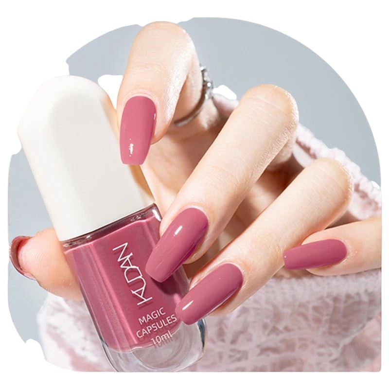 COMFORTH water-based peel off nail polish in dusty rose. 10ml bottle shown with manicured nails.
