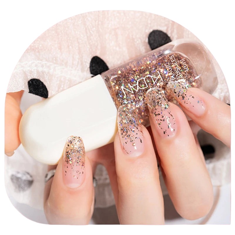 COMFORTH water-based peel-off nail polish with gold glitter accents on sheer nude nails.