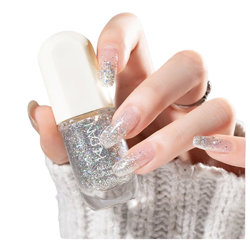 COMFORTH water-based peel-off nail polish in silver glitter. 10ml bottle shown on a hand with matching glitter nails.