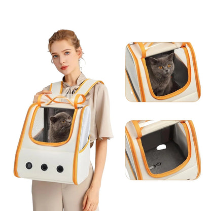 COMFORT cream and orange pet carrier backpack with mesh panels and a grey cat inside, worn by a woman.
