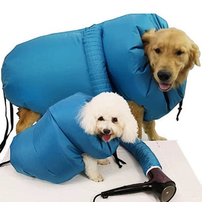 COMFORT blue pet drying bag with two dogs, one golden retriever and one bichon frise, being dried by a hairdryer.