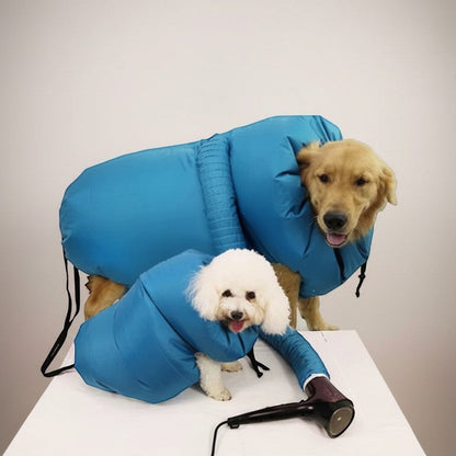 COMFORT blue pet drying bag with two dogs, one golden retriever and one poodle, inside. A hairdryer is attached.